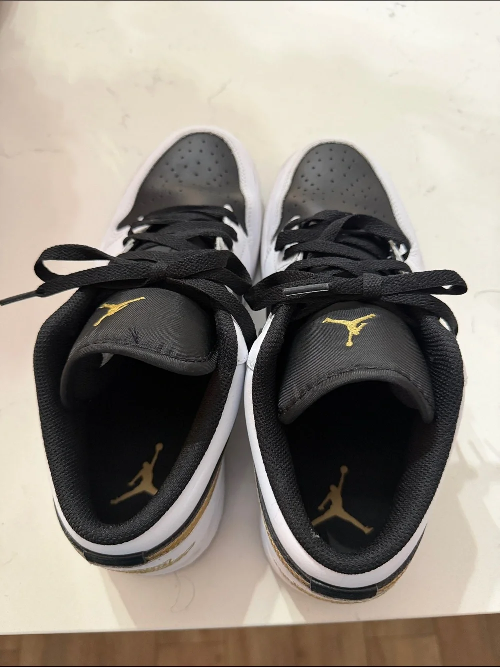 Jordan Low Top Sneakers in Black & Gold